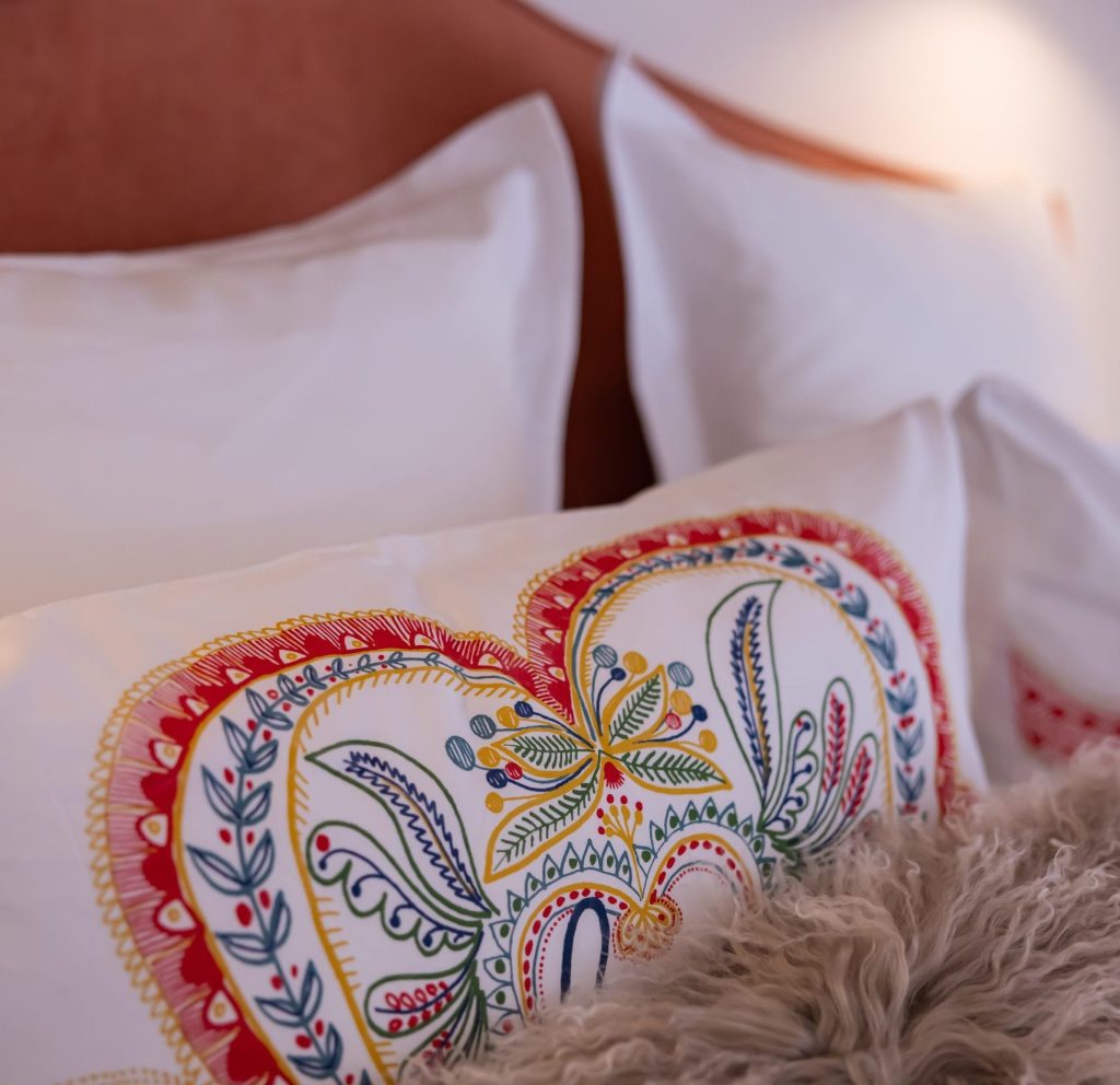 La Tzoumaz Lodge detail of the red double bedroom